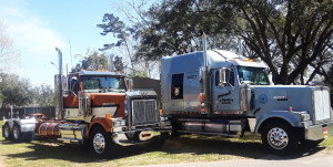 The 2005 Western Star (right) will not be his last truck. Shown sitting in his yard here is also a new, 300-inch-wheelbase 2022 Western Star 4900EX daycab. Jay's moving toward having a custom sleeper installed in the coming year -- the unit will be Jay's 