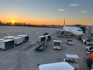 A plane sits at a gate at the Orlando International Airport on Wednesday.