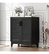 Black wooden cabinet with textured doors, alongside a metal umbrella stand in a white-walled room with decorative elements.