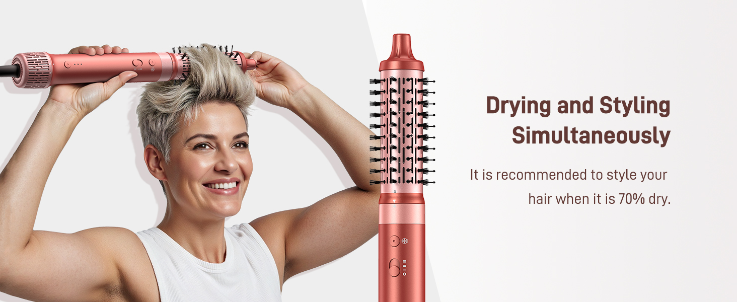 Text reads 'Drying and Styling Simultaneously'. Man holding red barrel hair brush/blow dryer styling tool. Product enables combined drying and styling function in one tool.