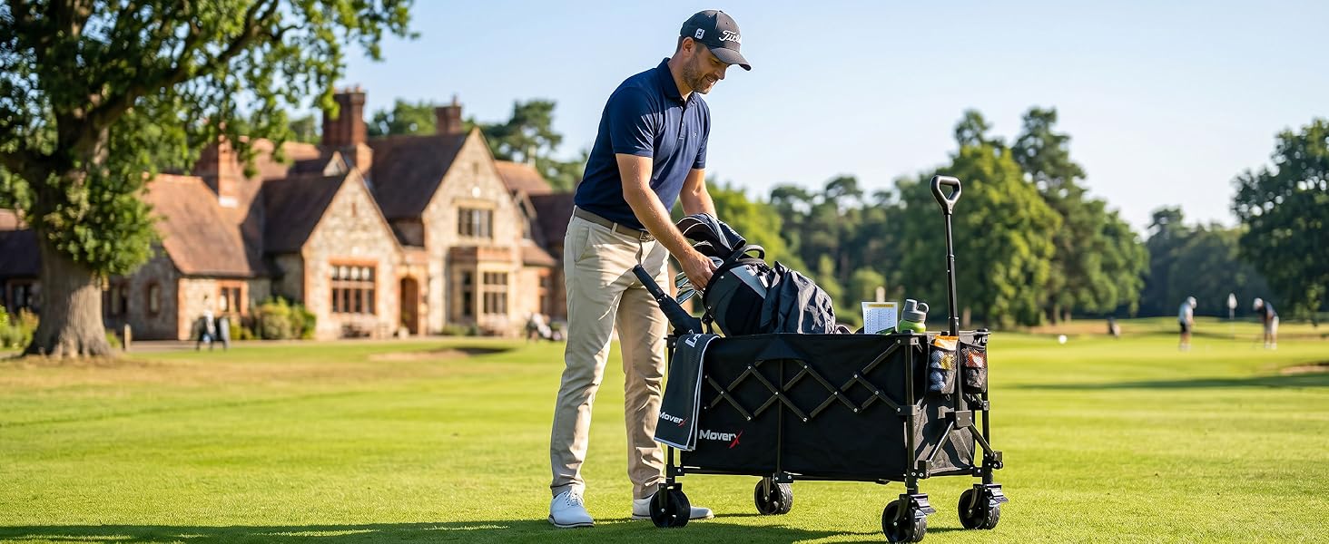 Man in dark jacket pushing black baby stroller on manicured green lawn with large stone mansion in background.