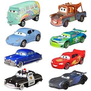 Text reads 'LIGHTNING MCQUEEN SOLD SEPARATELY. SUBJECT TO AVAILABILITY.' Red semi-truck toy carrier with extending ramp shown carrying red race car toy.