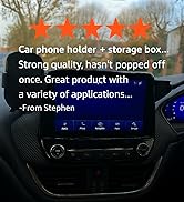 Vehicle dashboard display showing navigation interface with multiple menu options visible on the screen.