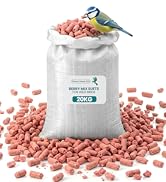 Text reads 'BERRY ARK GUY'S PREMIUM 30L BAG'. Pink/coral colored pellet dog food in clear bag with blue label and yellow bird perched at bottom.