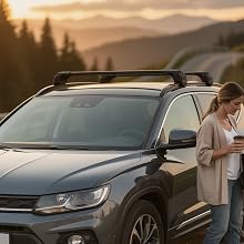 Text reads 'Image 1'. White SUV photographed in outdoor natural setting during golden hour, showing multiple angles of the vehicle parked on dirt ground with trees in background.