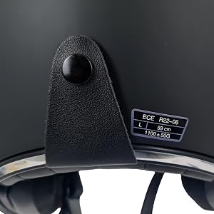 Multiple angles of a black protective helmet or headgear with red adjustment straps and padding visible from different viewpoints.
