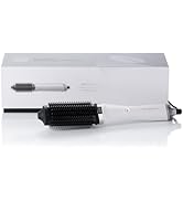 Text reads "ghd" and "flip drying hot brush". Black cylindrical hair styling brush with vented barrel design and heat-resistant handle, displayed with product packaging box featuring gold and black branding.