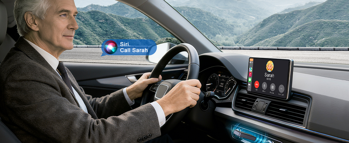 Interior view of car dashboard with mounted digital display screen, showing driver navigating mountain road with scenic lake view.