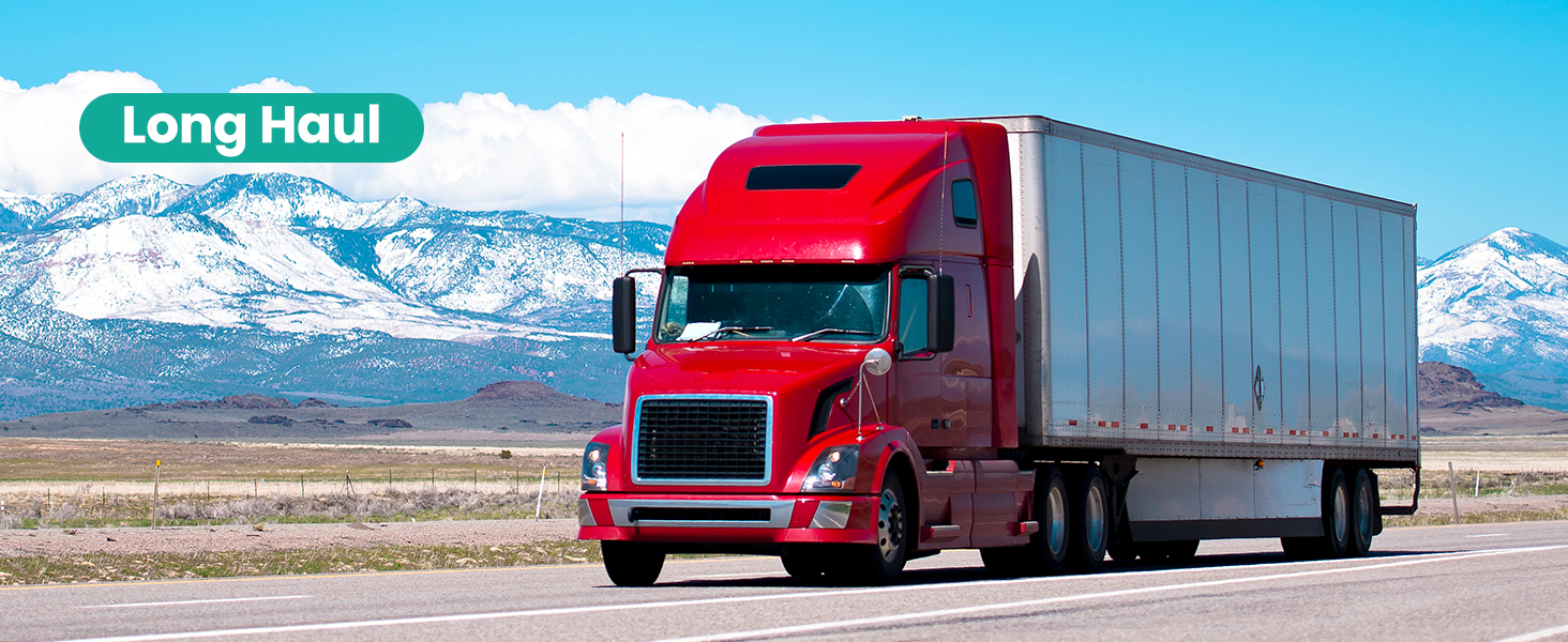 Text reads 'Long Haul'. Multiple red semi-trucks on highway with mountain landscape backdrop, showing different angles of commercial freight vehicles.