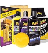 Text reads 'Meguiar's Ultimate Care Kit'. Collection of car care products including multiple black containers, applicator pads, and polishing tools arranged in product showcase format.