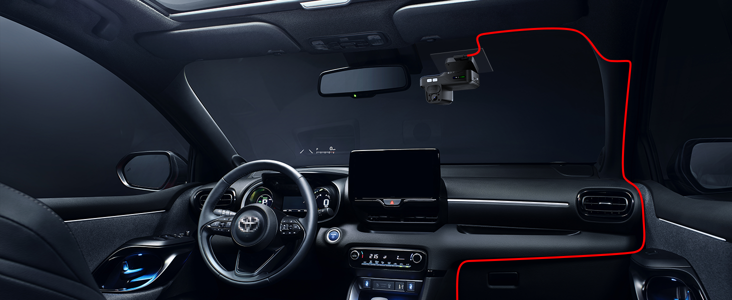 Modern car interior featuring a steering wheel, digital dashboard display, and center console touchscreen. Dark interior with ambient blue lighting accents.