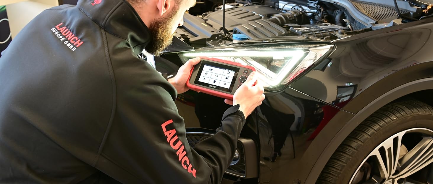 Vehicle maintenance or repair scene showing detailed close-up shots of mechanical work being performed on what appears to be an automobile.