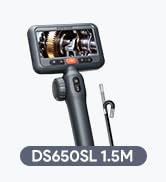Text reads 'DS650DL 1.5M'. Digital inspection camera with attached probe and controller unit. Black cylindrical device with screen display for viewing interior spaces.