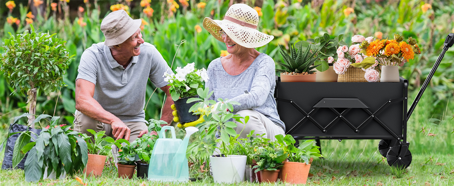 Two people gardening outdoors with potted plants and a black bench or container visible in the background.