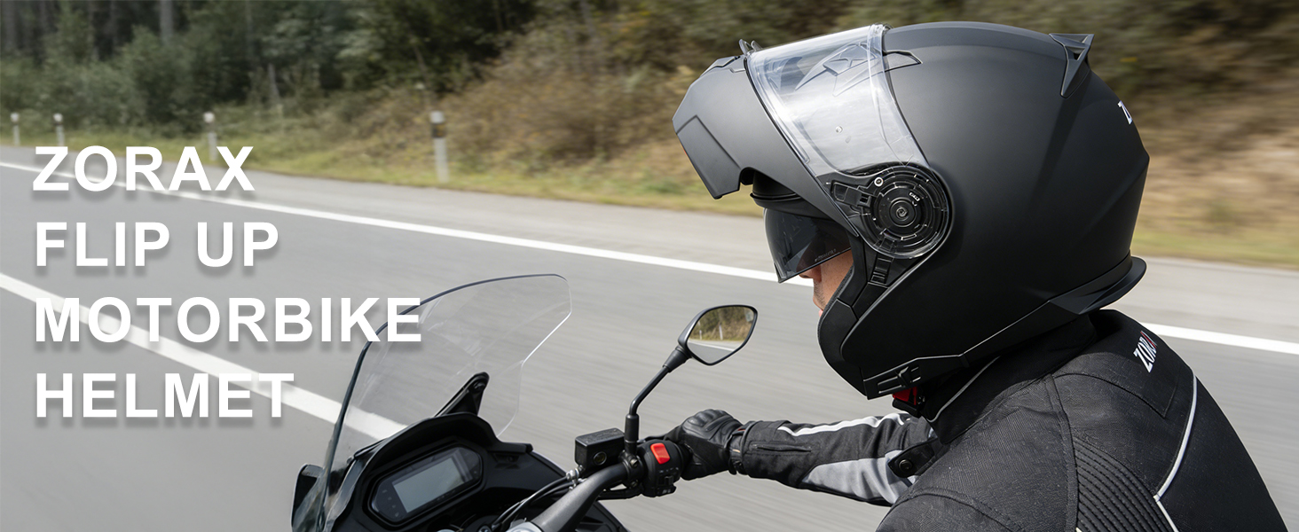 Text reads 'MOTORBIKE', 'DORAX FLIP UP HELMET'. Multiple views of a motorcycle helmet shown on a road background, featuring flip-up visor design and sleek black finish.