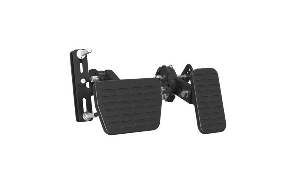 Black vehicle pedal assembly showing brake and accelerator pedals with textured rubber pads mounted on adjustable metal brackets.