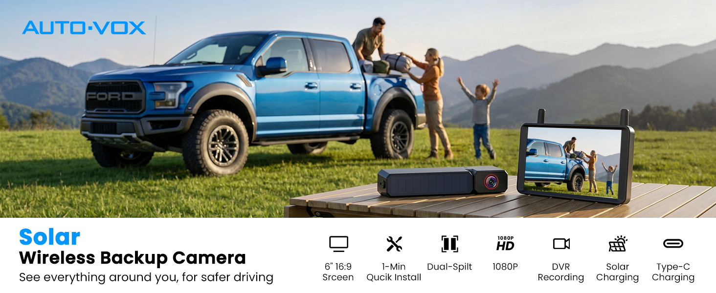Text reads "AUTO-VOX" and "50 Plus Wireless Backup Camera". Blue pickup truck photographed outdoors with family displaying wireless backup camera system and portable display monitor on grass.