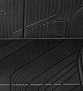 Close-up black and white architectural or interior design image showing geometric lines and shadows in a modern space.