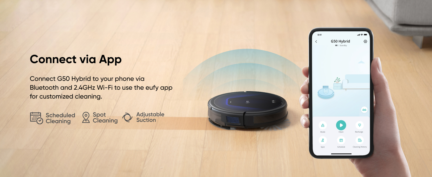 Round robotic vacuum cleaner with smartphone app control interface showing scheduling, smart cleaning, and adjustable functions on wooden floor.