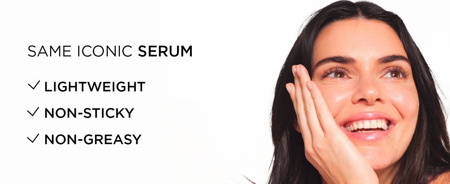 Text reads 'SAME ICONIC SERUM' with checkmarks for 'LIGHTWEIGHT', 'NON-STICKY', 'NON-GREASY'. Woman's face shown smiling with hand near cheek, demonstrating skincare serum product application.