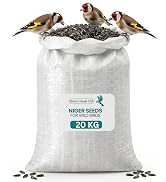Text reads "Direct Feed UK", "NIGER SEEDS", "FOR WILD BIRDS", "7L BAG". Clear plastic bag containing black Niger seeds with product label and yellow finch perched beside it on white background.