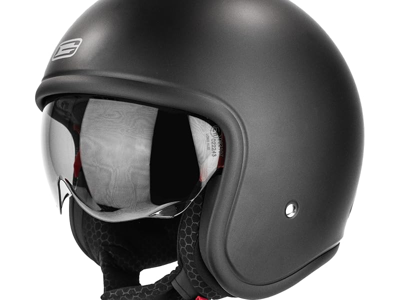 Black full-face motorcycle helmet with matte finish, open-face visor design, padded interior visible, featuring chin strap and ventilation details for rider protection.