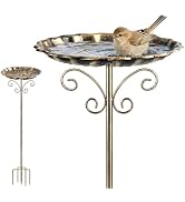 Black metal outdoor bird feeding platform with central post, hanging seed feeders, and perching surface; designed to attract birds for garden observation.