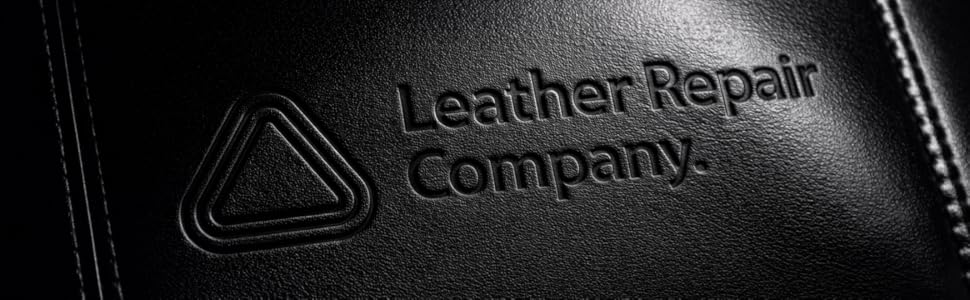Text reads 'Leather Repair Company'. Close-up of embossed or debossed black leather texture with company name.