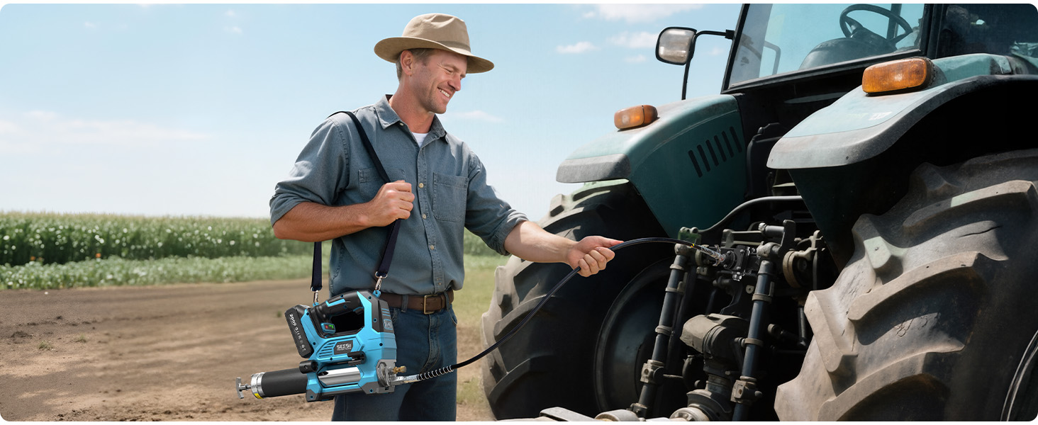 Man holding blue portable power tool standing outdoors next to tractor in rural farm setting.