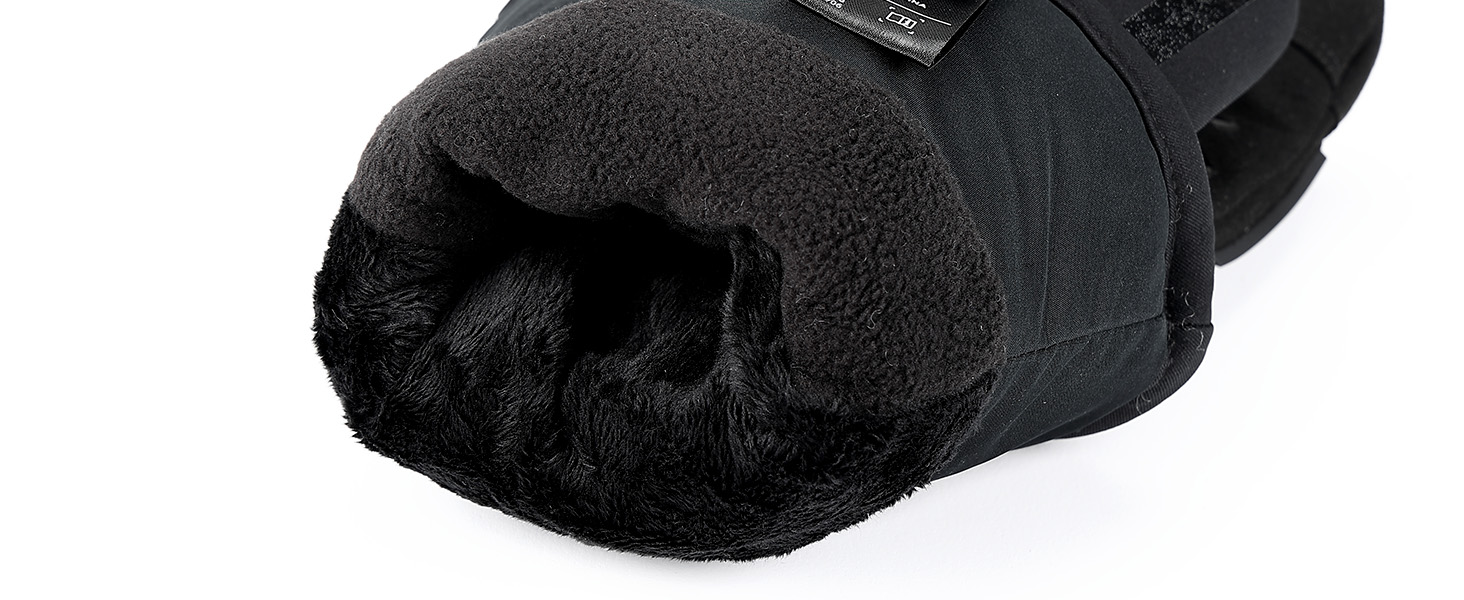 Black textured glove or mitt with fuzzy interior lining, photographed against plain background. Item appears to be a winter or work glove with padded palm area.