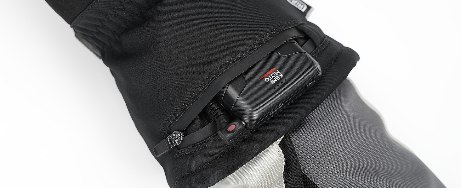 Close-up of black fabric armband or sleeve with textured pattern and small red logo detail on white background.
